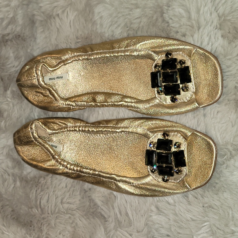 Miu Miu Gold Flats with Black Embellishments